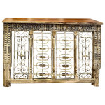 Mogul Interior - Consigned Antique Console Table Tall Iron Jali Carved TV Table Bar Table - Iron Lattice Carved antique Console Table. Showcasing a striking floral design and unique iron lattice work, this rustic hall table is a standout piece. style your space with the distinct charm of reclaimed vintage furniture, featuring a distressed patina in old-world style. Perfect for use as a TV table, bar console, or entryway statement piece, this versatile table evokes a rustic yet regal aesthetic.  The flat top exterior offers an ideal surface for displaying a television, family photos, art pieces, or sculptures, making it a versatile and stylish addition to your home.