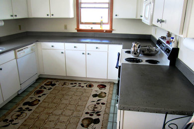 Example of a classic kitchen design in Other