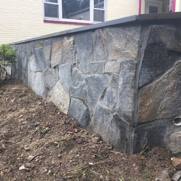 Irregular Flagstone Patioin Silver Spring MD With Stone Sitting Walls