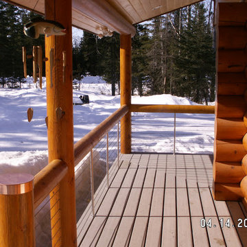 Kenai, AK Peeled Wood Posts and Top Rail with Steel Posts and Cable Infill