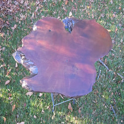 Live edge reclaimed tree stump side table with stylized wrought iron base - Side Tables And End Tables