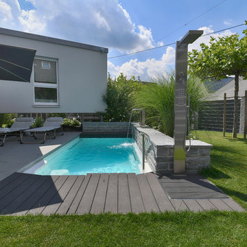 Ein moderner Familiengarten mit Pool