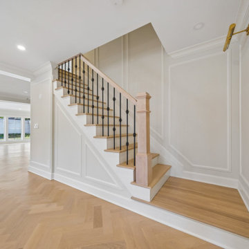 Staircase with Iron Balusters & Wainscoting in Teaneck, NJ