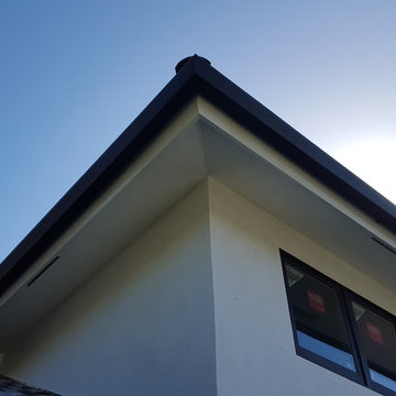 Huntington Beach California, White Fascia Wrap, Black 6 inch Angle Face Gutters