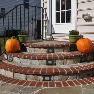 Flagstone Walkout Door Steps with Brick Border Treads and Chocolate Grey Risers