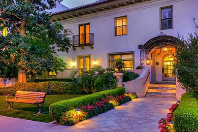 Example of a tuscan exterior home design in San Diego