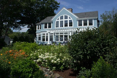 Elegant home design photo in Portland Maine