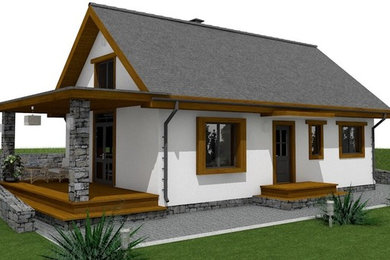 Стильный дизайн: маленький, одноэтажный, белый частный загородный дом с облицовкой из цементной штукатурки, двускатной крышей и крышей из гибкой черепицы для на участке и в саду - последний тренд