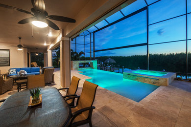 Pool - mid-sized modern indoor tile and custom-shaped infinity pool idea in Miami