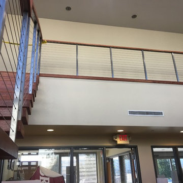Double steel stringer open risers and cable railing