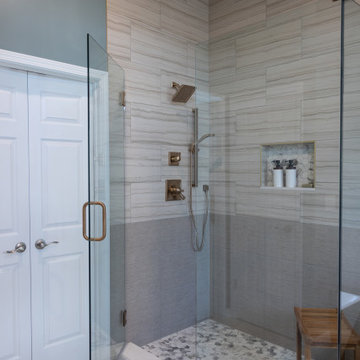 Spa Like Primary Bathroom Remodel with Warm Wood & Brass Details