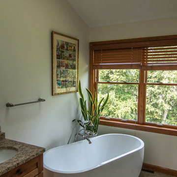 Master bath featuring a rustic character cherry vanity cabinet