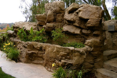 This is an example of a rustic backyard landscaping in Orange County.
