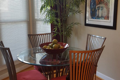Large minimalist dining room photo in Other
