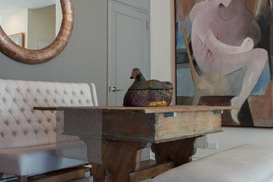 Example of a transitional living room design in New York