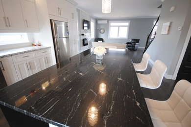 Kitchen - modern kitchen idea in Other