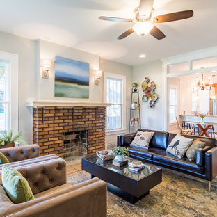 Mid-sized arts and crafts open concept light wood floor living room photo in Jacksonville with gray walls, a standard fireplace and a brick fireplace