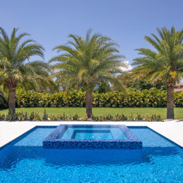 Edgy Pool With Custom Bowls and Stepping Stones in Plantation, Florida