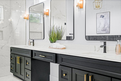 Example of a transitional white tile white floor and double-sink alcove shower design in Austin with recessed-panel cabinets, black cabinets, white walls, an undermount sink, a hinged shower door, white countertops and a built-in vanity