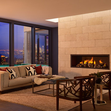 City View Living Room With Modern White Stone Fireplace