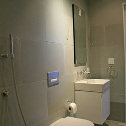 Concrete wall panels and bathhroom floor - Tile
