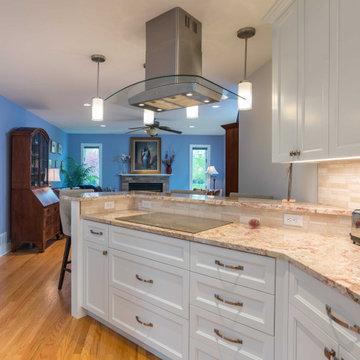Modern Kitchen with White Flat Panel Shaker Cabinets & Natural Stone Backsplash