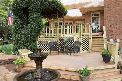 Deck container garden - large traditional backyard mixed material railing deck container garden idea in Atlanta