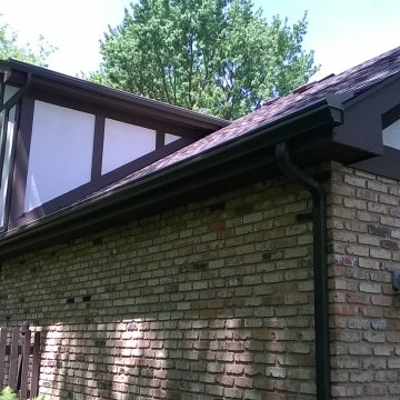 New gutters, downspouts, and gutter topper.