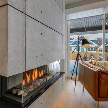 3-Sided Fireplace with Concrete Feature Wall | Fonthill, ON