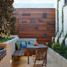 Timber bench into retaining wall