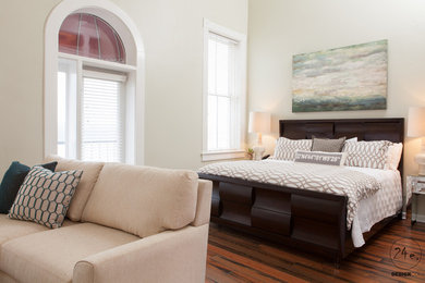 This is an example of a transitional bedroom in Atlanta.