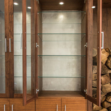 Walnut and silver leaf cabinets and logstore