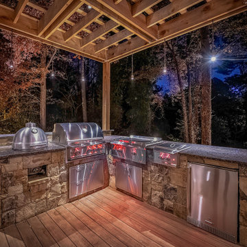Outdoor Kitchen with Stone & Wood Detailing