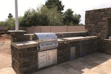 Large BBQ island, outdoor kitchen and outdoor entertainment center