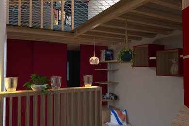 Exemple d'un petit salon mansardé ou avec mezzanine tendance avec un mur rouge, parquet clair, un poêle à bois et un sol marron.