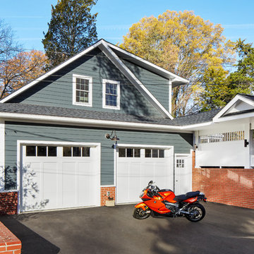 A Mechanic's Garage with Pool House above