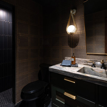 Metallic Textured Wallcovering and Sculptural Brass Lighting in a Moody Powder R