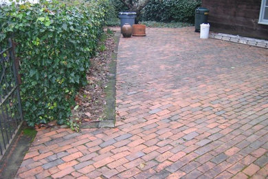 Brick driveway over living space