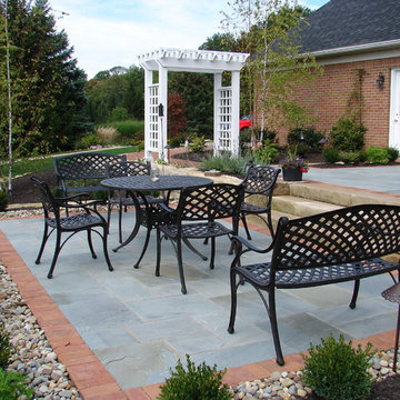 Natural Stone Patio with barnstone walls