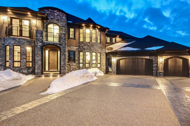 Inspiration for a large contemporary exterior home remodel in Calgary