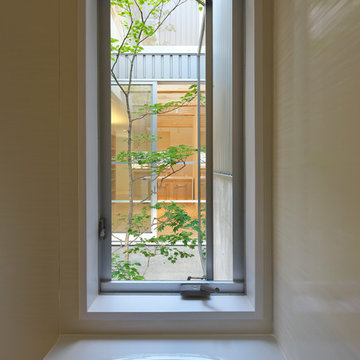 阿倍野の家 シンボルツリーのある中庭を囲む家 House in Abeno