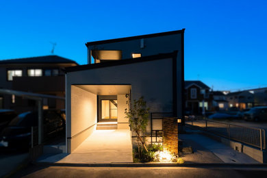 中庭でつながるビルトインガレージのある家／House with Built-in Garage connected by Courtyard