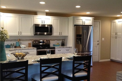 Example of a mid-sized trendy kitchen design in Seattle