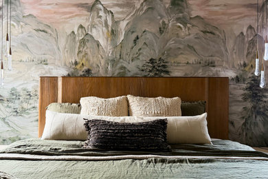 Inspiration for a large transitional vinyl floor, brown floor and wainscoting bedroom remodel in Denver with beige walls, a standard fireplace and a stone fireplace