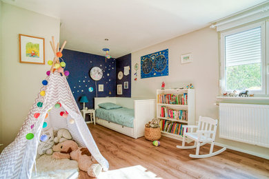Photo of a large gender neutral kids' bedroom in Strasbourg.