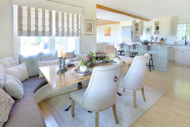 Example of a transitional kitchen/dining room combo design in Other