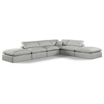 Meridian Furniture - Comfy Upholstered L-Shaped Modular Sectional, Grey, 6-Piece: 3 Armless Chair, 1 Corner Chair, 2 Ottoman, Linen Textured Fabric - Give your space a whole new look with this grey Comfy linen textured fabric sectional. This handsome sectional fits nicely with other items in the Comfy collection and is a versatile seating option designed for adaptability, comfort and style. Wrapped in rich grey durable linen textured fabric upholstery, this sectional offers a plush embrace of overstuffed down feather cushions, carefully crafted to deliver the highest level of comfort. The perfect seat for creating an oasis for relaxation, this sectional has thick foam surrounding its frame for added support and coziness.