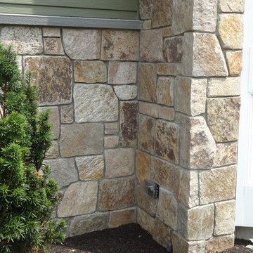 Combining Colonial Tan Natural Stone with Olive Green Siding