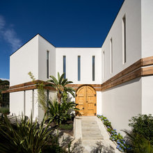 Les portes traditionnelles s'invitent dans 8 projets contemporains