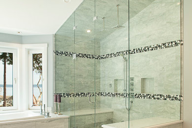This is an example of a large transitional master bathroom in Other with an alcove shower, gray tile, porcelain tile, grey walls, porcelain floors, beige floor and a hinged shower door.